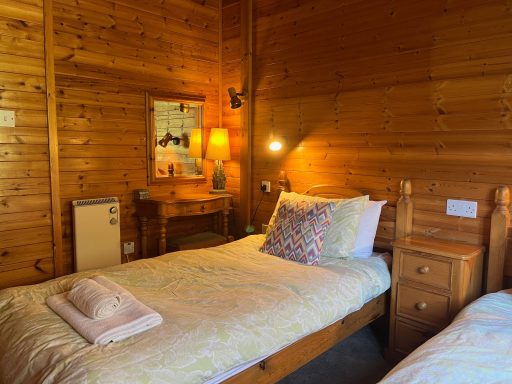 twin wood clad bedroom